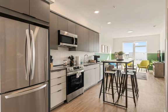 Light-Filled 2BD Suite in K-Town | Parking & Gym - Image 2