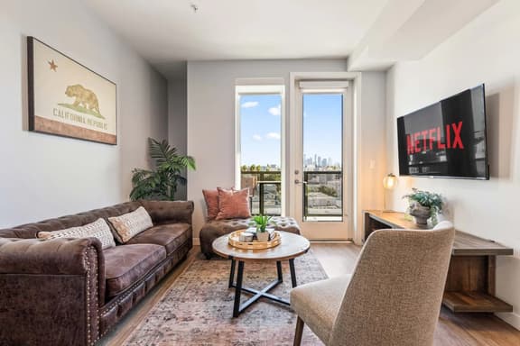 Light-Filled Modern 2BD in K-Town + Hot-tub & Gym - Image 1